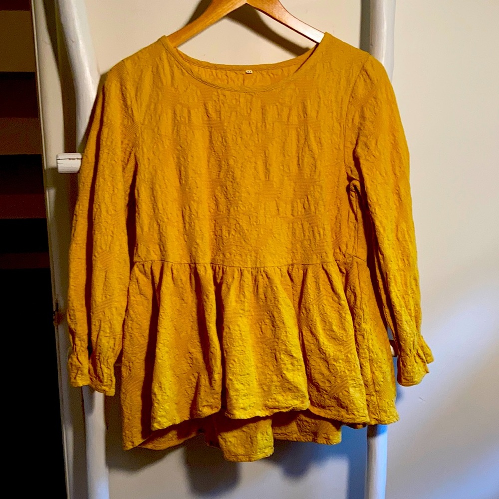 Cute as a button! Minibee smock top in rich ochre